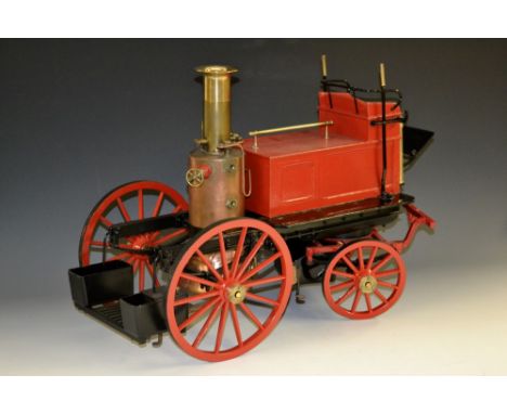A Shand Mason model fire engine, four wheeled chassis, red and black painted body, copper and brass boiler and chimney,   wit