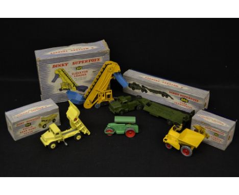A Dinky Tank Transporter,  660, boxed;   others, Elevator Loader,  964;  Euclid Rear Dump Truck, 965; Muir Hill Dumper Truck,