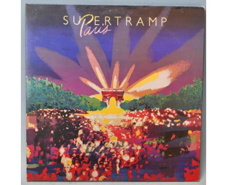 A vinyl LP long play record by Supertramp / Paris. First UK pressing. AMMLM 66702 Stereo. Media condition VG+, Sleeve Conditi