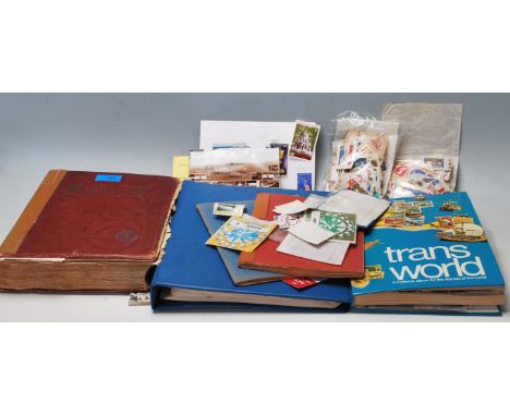 A collection of world postage stamps across multiple items to include a wide selection of mid to late 20th Century stamps to 