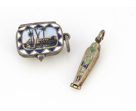 Two early 20th Century German and enamel charms, both of Egyptian influence including a small mummy sarcophagus which opens t