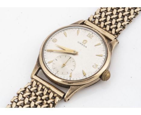 A 1940s and later Omega manual wind 9ct gold wristwatch, 34mm 9ct gold case, silvered dial with batons and subsidiary, moveme