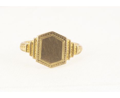 A 9ct gold Art Deco child's signet ring, the hexagonal tablet top with stepped shoulders, ring size F, 1.6g 