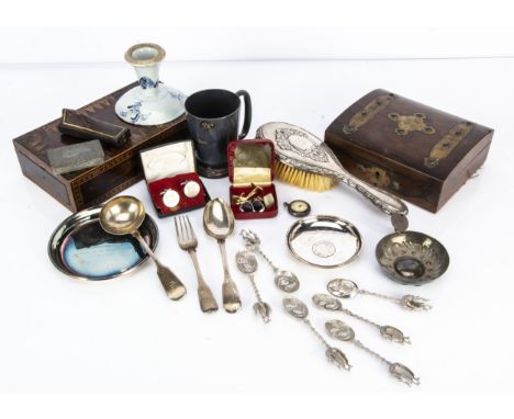 A mixed lot, including two silver spoons and a silver fork, a sterling marked dish with inset Hong Kong coin, two wooden boxe