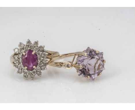 Two 9ct gold dress rings, including a ruby and diamond cluster example, ring size P, and an amethyst and diamond dress ring, 