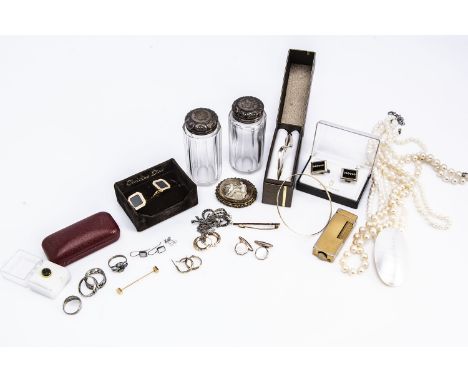 A 9ct gold bangle,  3.3g, together with a pair of silver topped glass dressing table bottles and various costume jewellery 