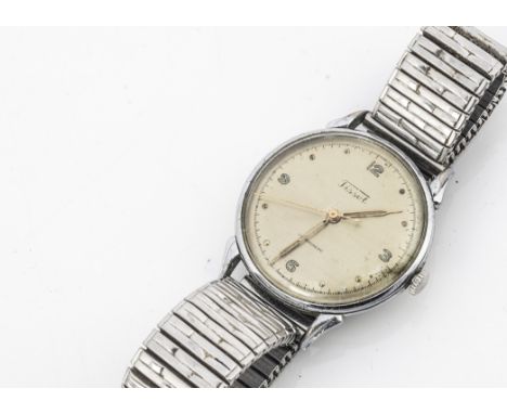 A vintage Tissot manual wind stainless steel wristwatch, 34mm case with gold coloured dial, appears to run, on later expandin