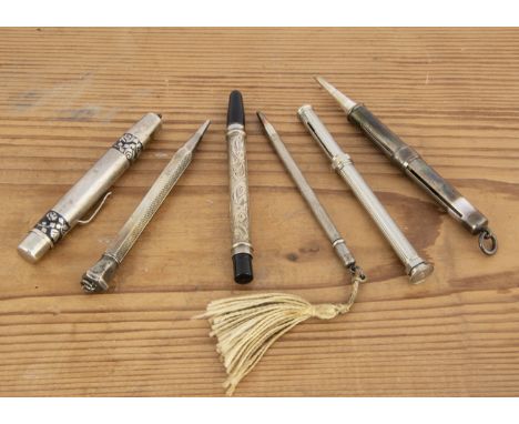 Six vintage silver and silver plated pencils, AF, including a Mordan retractable, a white metal and black enamel Niello style