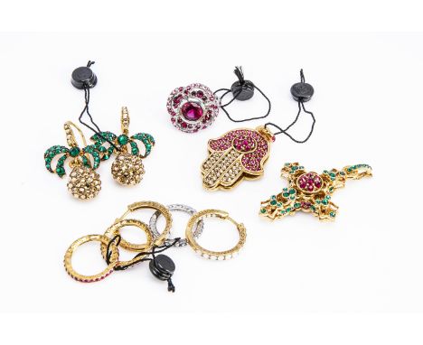 A large collection of costume jewellery, all contemporary including rings earrings, pendants, paste set with enamel decoratio
