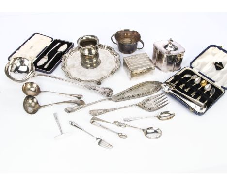 A collection of silver and silver plate flatware, including a plain George V silver card tray, 21cm diameter and 11.7 ozt, wi