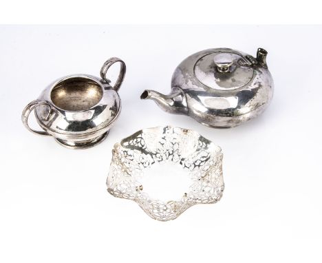 A 1970s silver pierced bon bon dish by R.H &amp; Son, 3.98 ozt, together with an Elkington silver plated teapot, AF, and plat