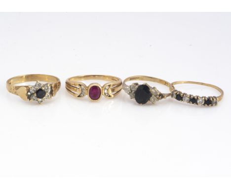 Four 9ct gold gem set rings,  including a ruby and diamond ring, two cluster rings and another, 7.2g 