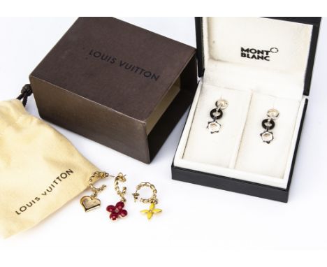 A cased pair of Mont Blanc earrings, in silver and enamel, comprising of a circular stud supporting an enamel ring above Mont