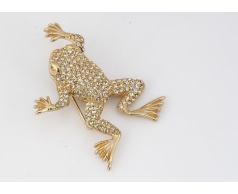 A Christian Dior frog brooch, encrusted with paste set gems, having pin back, 5cm x 3.5cm, 12.4g 