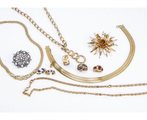 A collection of gilt metal costume jewels,  including a large flower head brooch, various enamel dress rings and other items 