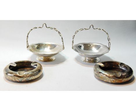 Pair of Chinese export silver bon-bon baskets with fixed wire handles by Wang Hing of Hong Kong and a pair of ashtrays with e