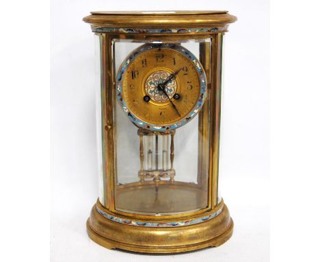 Late 19th century French brass and champlevé enamel four glass mantel clock, the gilded dial with Arabic numerals, twin train