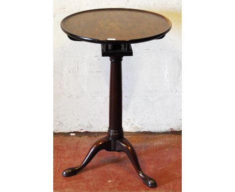 George III style mahogany birdcage tripod table, the snap-action dish-shaped swivel top on cylindrical column and tripod supp