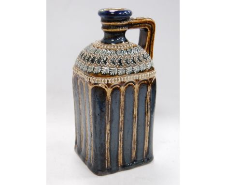 Victorian Doulton Lambeth stoneware spirit flask, the square-bodied flagon with broad shoulders, narrow spout and incised Art