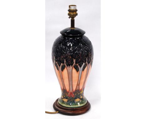 Moorcroft table lamp in the Art Deco style, with multi-coloured ground, 27cm high. 