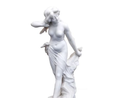 A Cipriani (Italian) White marble figure modelled as a scantily clad female standing on a rock, signed to the base, A. Cipria
