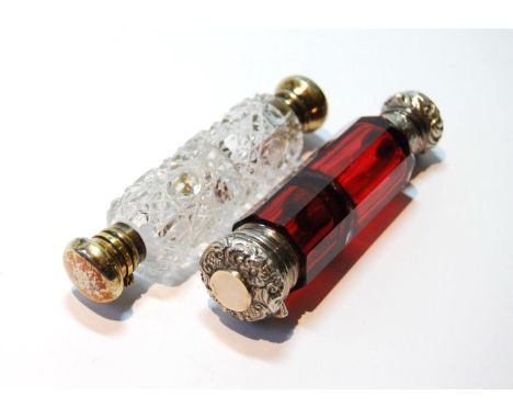 Victorian ruby glass scent bottle, octagonal, with embossed caps and gold discs, one with vinaigrette quill, and a similar ho