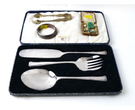 Boxed plated dessert service set, sugar tongs, hallmarked bangle weighing 29 grams and a box of enamelled brooch and earrings