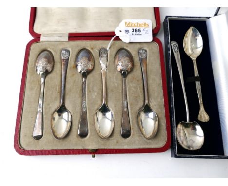 Cased set of six silver teaspoons embellished to the rear of the spoon with a basket of flowers, a boxed Millennium hallmarke