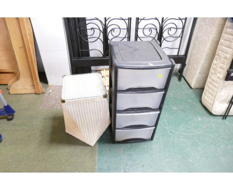 Plastic drawers and wicker laundry hamper 