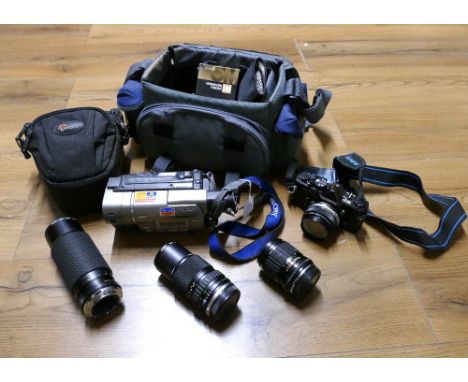 Olympus 0M2 camera in a bag with lenses and accessories and a Sony Handycam 