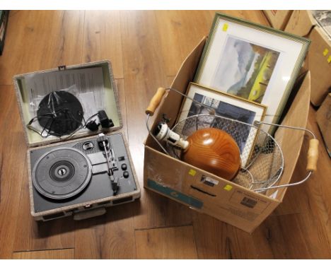 Box of pictures including Shirley Shackleton print, wooden lamp base, Crosley portable record player