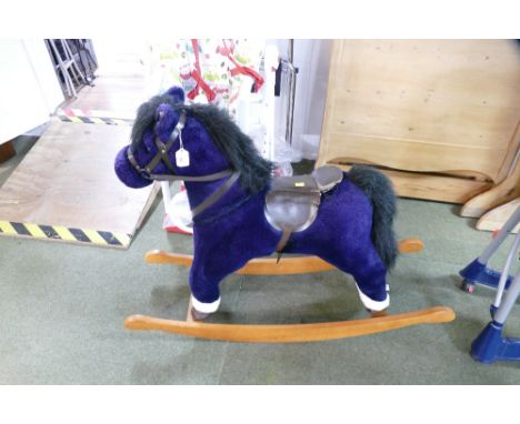 Purple plush rocking horse 