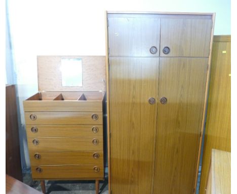 Matching mid century double wardrobe and a tall set of drawers with hinged lid, lidded top 