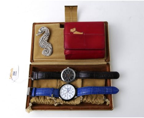 Suede covered case, containing a Bruno Calvani gents watch and another marked Bulova and a red leather Radley purse  