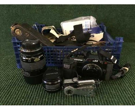 Box of Olympus OM70 camera, lenses, plate camera, Bell and Howell 8mm magazine camera etc.