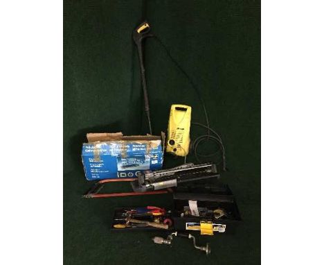 A Karcher pressure washer together with a mitre saw, tool box, tile cutter etc