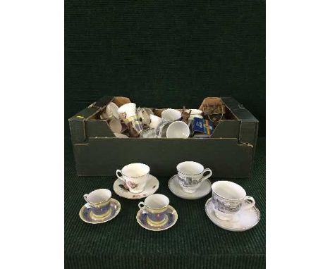 Four boxes of china, glass ware, collector's plates, light fittings etc