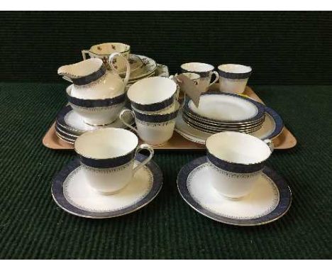 A Royal Doulton Sherbrooke tea service, together with Royal Doulton old Leeds Sprays part dinner set