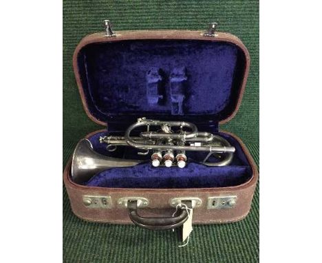 A cased cornet by Lark