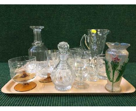 A tray containing glass water jug and beaker, cut glass decanter, assorted drinking glasses etc