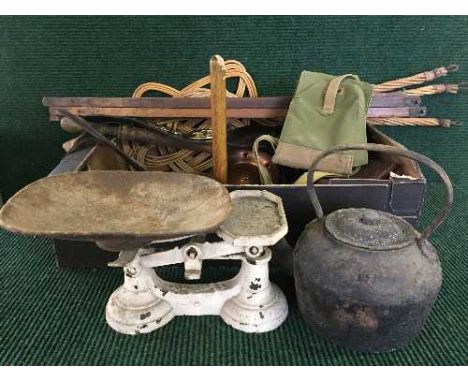 A box of horse brasses, folding artist's easel, kitchen scales, poss stick, carpet beaters together with a leather gladstone 