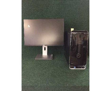 A Dell pc monitor, disc drive together with wireless cube speaker