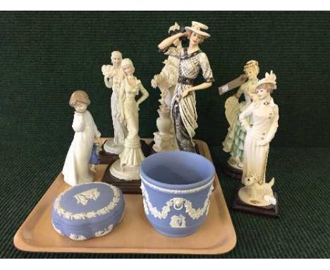 A tray of blue and white jasper ware lidded bowl, planter, Nao figurine, girl with teddy bear and six contemporary figures