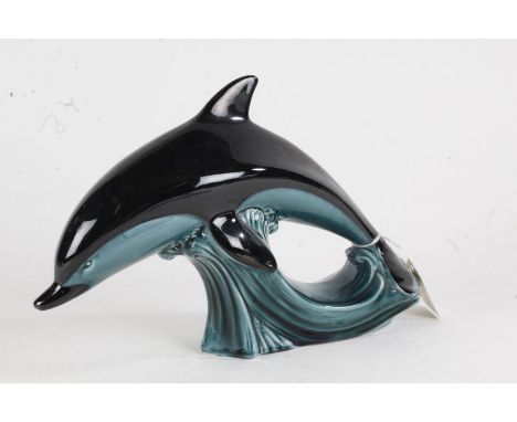 Poole pottery leaping dolphin. 27cm wide