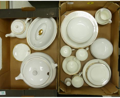 A collection of white and gold banded tea and dinner ware to include Royal Worcester oven dish, Minton saucers, Heritage soup