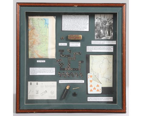 WW2 FRAMED MILITARIA DISPLAY. A framed display of Second World War militaria including, an aircrew/airborne escape compass, s