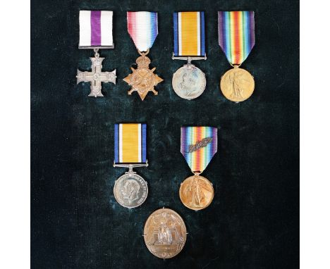WW1 M.C. HUSBAND AND WIFE GROUPING, MIDDLESEX REGIMENT. A First World War family grouping, husband and wife, of medals to inc