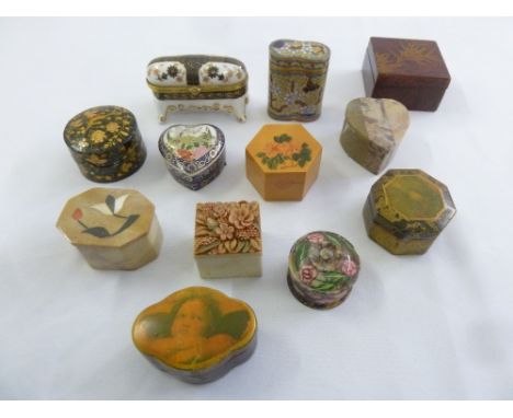 Twelve pill and patch boxes of various shapes and forms
