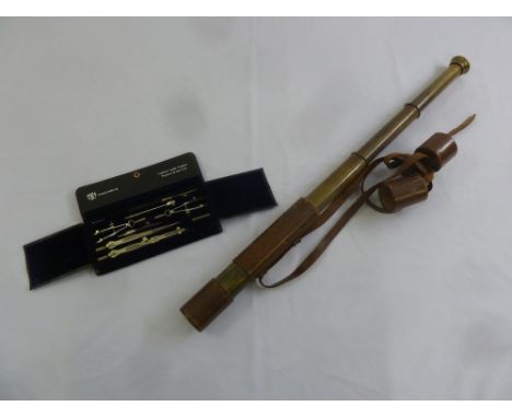 A brass three draw telescope in leather case by Broadhurst Clarkson & Co. and a cased geometry set