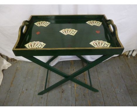 A rectangular lacquered tray on stand decorated with playing cards